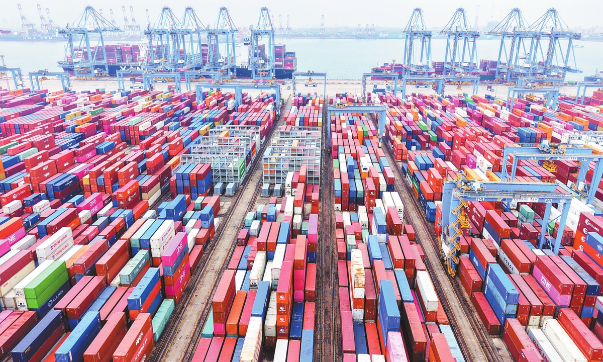 Cargo ships load and unload containers at Qingdao Port in East China's Shandong Province on March 4, 2025. Photo: CNS
