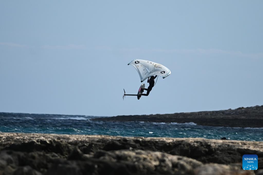 A kitesurfer is seen off the Bahar ic-Caghaq coast in Naxxar, Malta, March 6, 2025. (Photo: Xinhua)