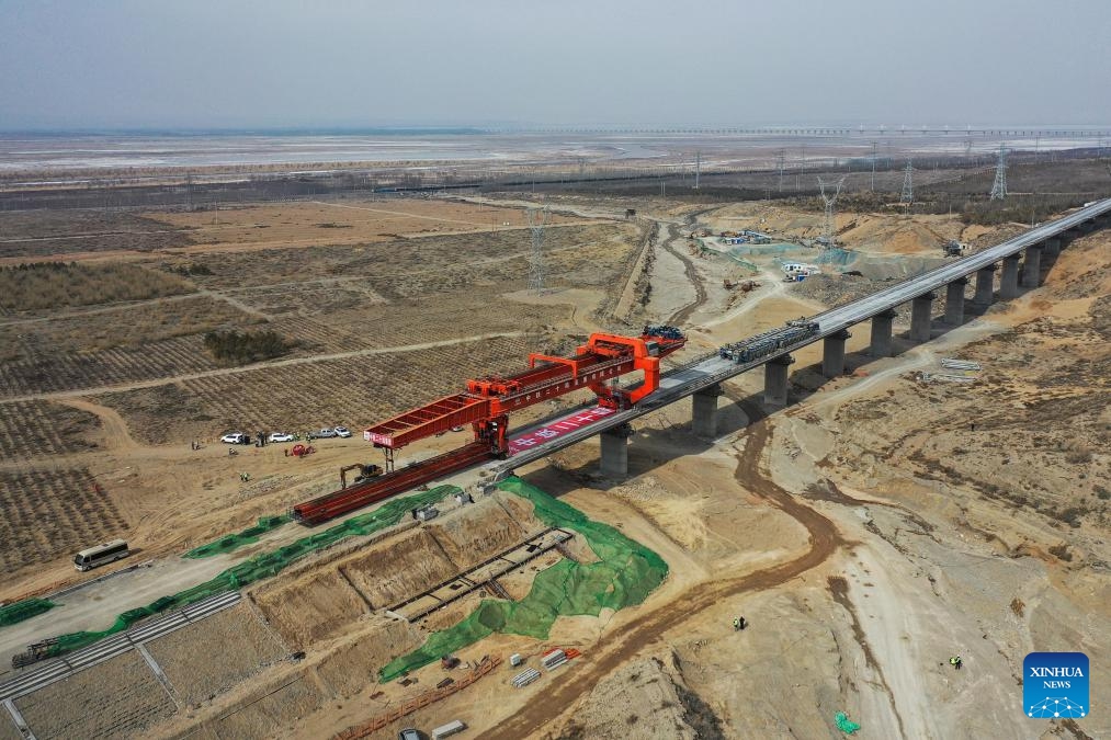 An aerial drone photo taken on March 6, 2025 shows the closed Heyuancun Grand Bridge of Baotou-Yinchuan High-speed Railway in north China's Inner Mongolia Autonomous Region. The Heyuancun Grand Bridge was successfully closed on Thursday, marking the completion of the bridges and tunnels within the Inner Mongolia section of Baotou-Yinchuan High-speed Railway, which links Baotou in Inner Mongolia and Yinchuan in northwest China's Ningxia Hui Autonomous Region. (Photo: Xinhua)