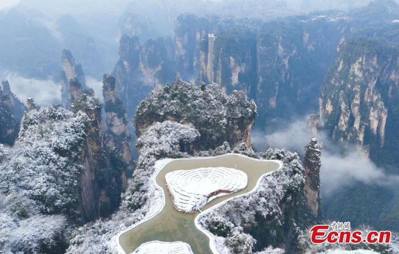 Rime-covered rock pillars stretch up endlessly to the sky in the land of Avatar at Tianzishan Scenic Area of Zhangjiajie, central China's Hunan Province, Mar. 6, 2025. (Photo provided to China News Service)







