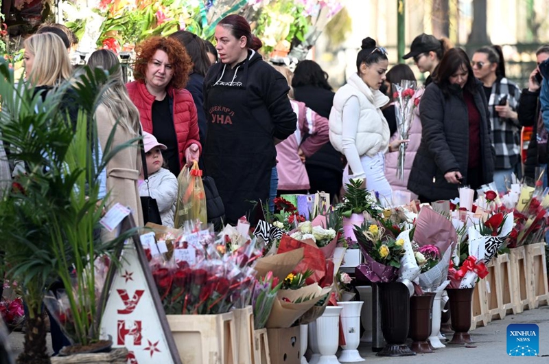 People buy flowers at a stand in Bitola, North Macedonia, on the occasion of International Women's Day, March 8, 2025. Photo: Xinhua