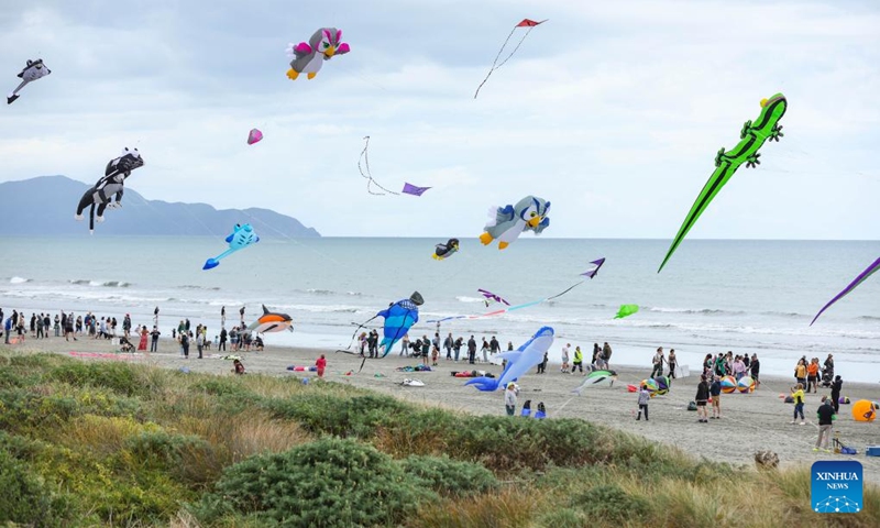 People fly kites at Otaki beach, New Zealand, March 8, 2025. Otaki Kite Festival was held here on Saturday. Photo: Xinhua