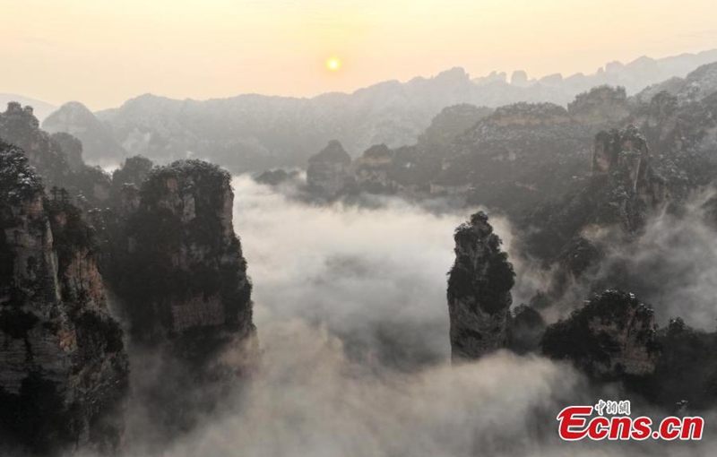 Rime-covered rock pillars stretch up endlessly to the sky in the land of Avatar at Tianzishan Scenic Area of Zhangjiajie, central China's Hunan Province, Mar. 6, 2025. (Photo provided to China News Service)






