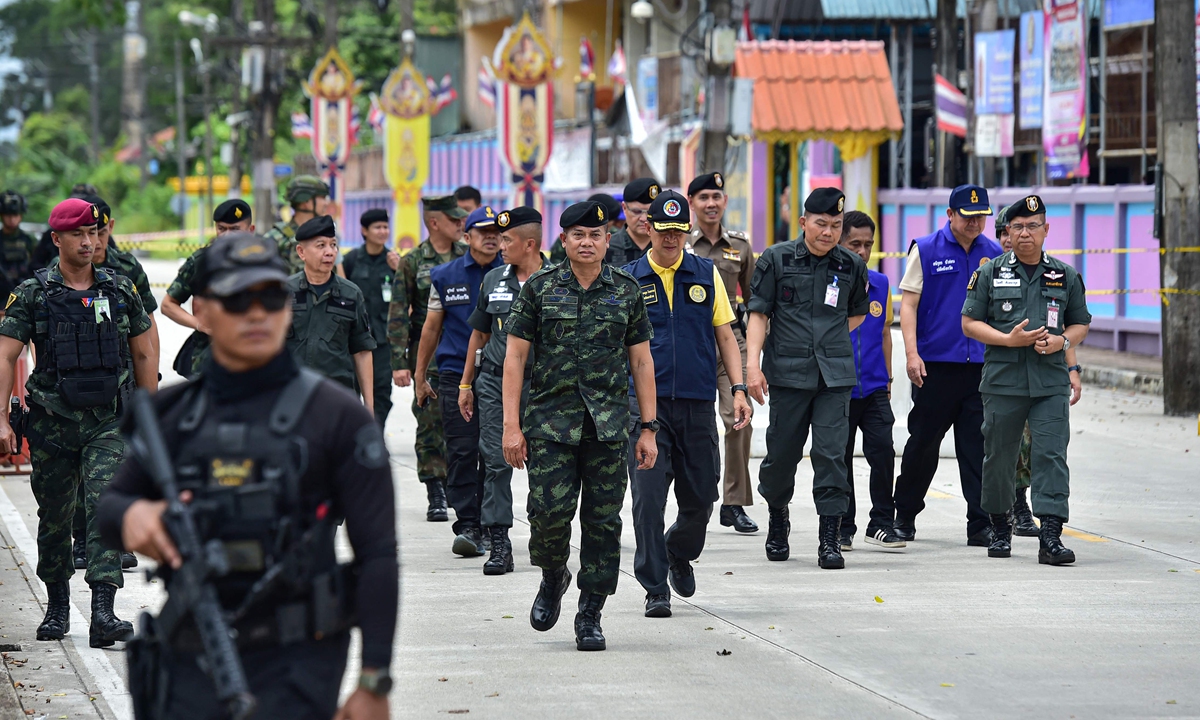 Thailand's Commander of the 4th Army Region Lieutenant General Paisan Nusang and officials inspect the site of an attack that killed two defense volunteers and injured 12 others, outside the district office of Sungai Kolok in southern Thailand on March 9, 2025. Photo: VCG