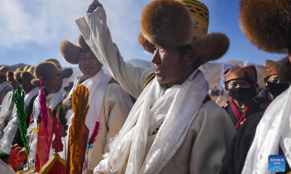 Farmers participate in a ceremony marking the start of spring farming in Codoi Township, Lhunzhub County of Lhasa, southwest China's Xizang Autonomous Region, March 16, 2025. Ceremonies marking the start of spring farming were held across Xizang on Sunday. The ceremony holds great significance as it marks the beginning of a new year's farming season and serves as a prayer for favorable weather and bountiful harvests. It is considered an important ritual in the farming regions of Xizang. (Xinhua/Jigme Dorje)