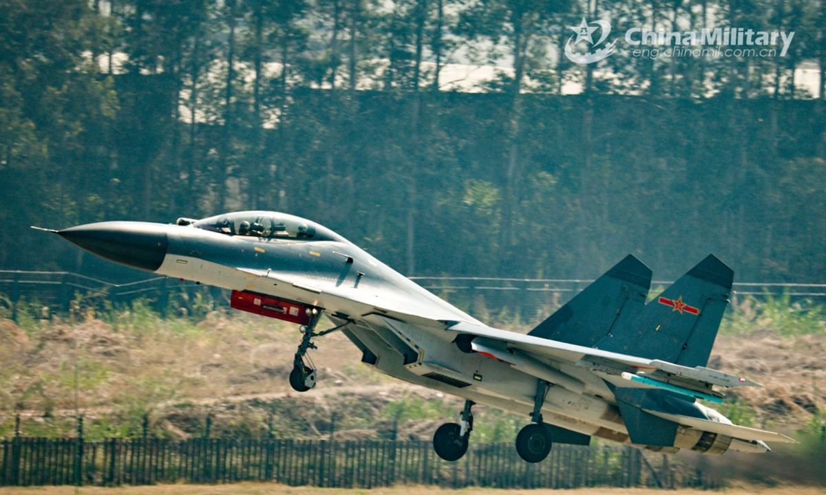 A fighter jet attached to an aviation brigade with the air force under the Chinese PLA Southern Theater Command takes off for a flight training exercise on February 20, 2025. (eng.chinamil.com.cn/Photo by Li Chengshen)