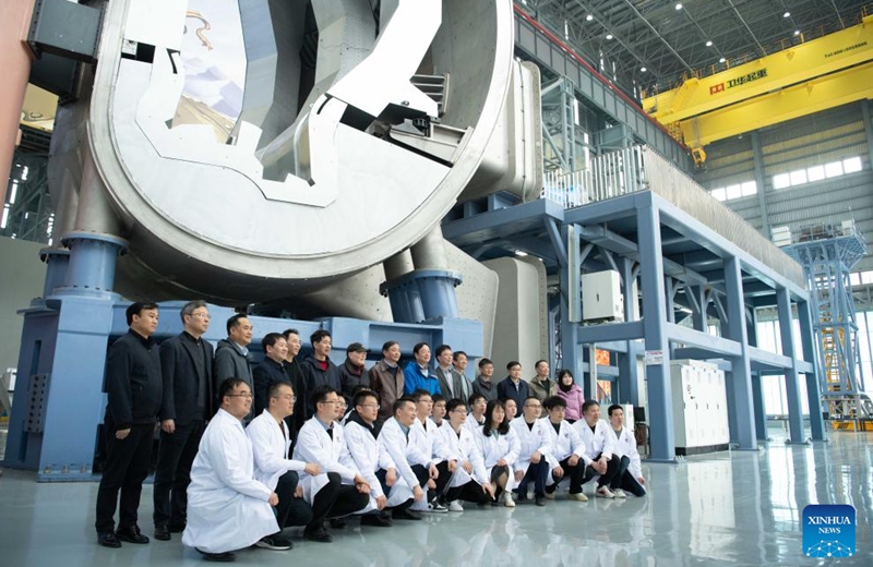 Researchers and experts pose for photos near the one-eighth vacuum chamber and overall installation system, one of the key subsystems of the Comprehensive Research Facility for Fusion Technology (CRAFT), in Hefei, capital of east China's Anhui Province, March 9, 2025. China has hit another milestone in the development of its next-generation artificial sun, with one of its key systems passing expert review and acceptance procedures on Sunday, achieving an internationally advanced development and operational capability standard.

The one-eighth vacuum chamber and overall installation system was developed by the Chinese Academy of Sciences' Institute of Plasma Physics (ASIPP). It is one of the 19 key subsystems of the Comprehensive Research Facility for Fusion Technology (CRAFT), a platform on which engineers develop and test the key components of fusion energy reactors. Photo: Xinhua