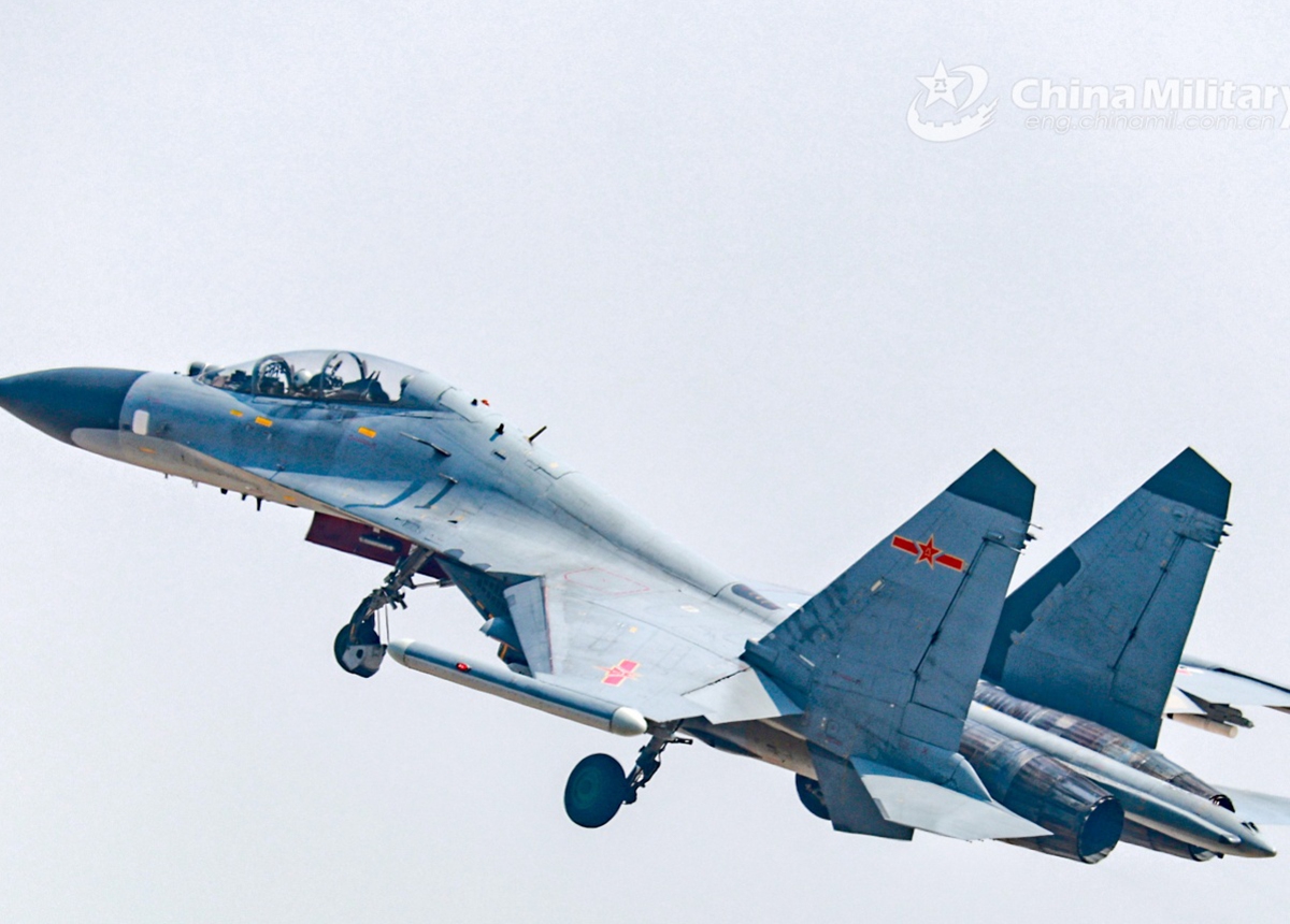 A fighter jet attached to an aviation brigade with the air force under the Chinese PLA Southern Theater Command speeds up to climb during a flight training exercise on February 20, 2025. (eng.chinamil.com.cn/Photo by Li Chengshen)