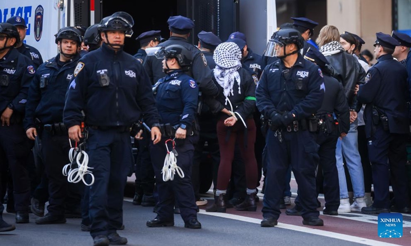 New York Police Department (NYPD) officers arrest demonstrators during a protest against the Donald Trump administration's policies on the Middle East, campus protests and immigration in New York City, the United States, March 11, 2025. (Photo: Xinhua)