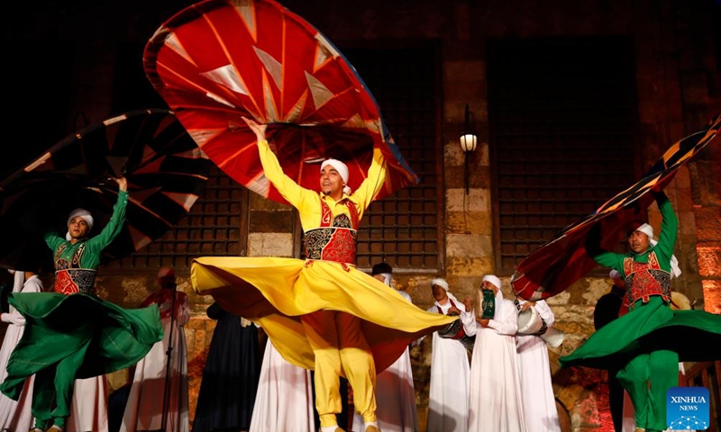 Dancers perform Tanoura, a traditional Egyptian folk dance, during the holy month of Ramadan at the Sultan Al-Ghuri complex in Cairo, Egypt, on March 12, 2025. (Photo: Xinhua)