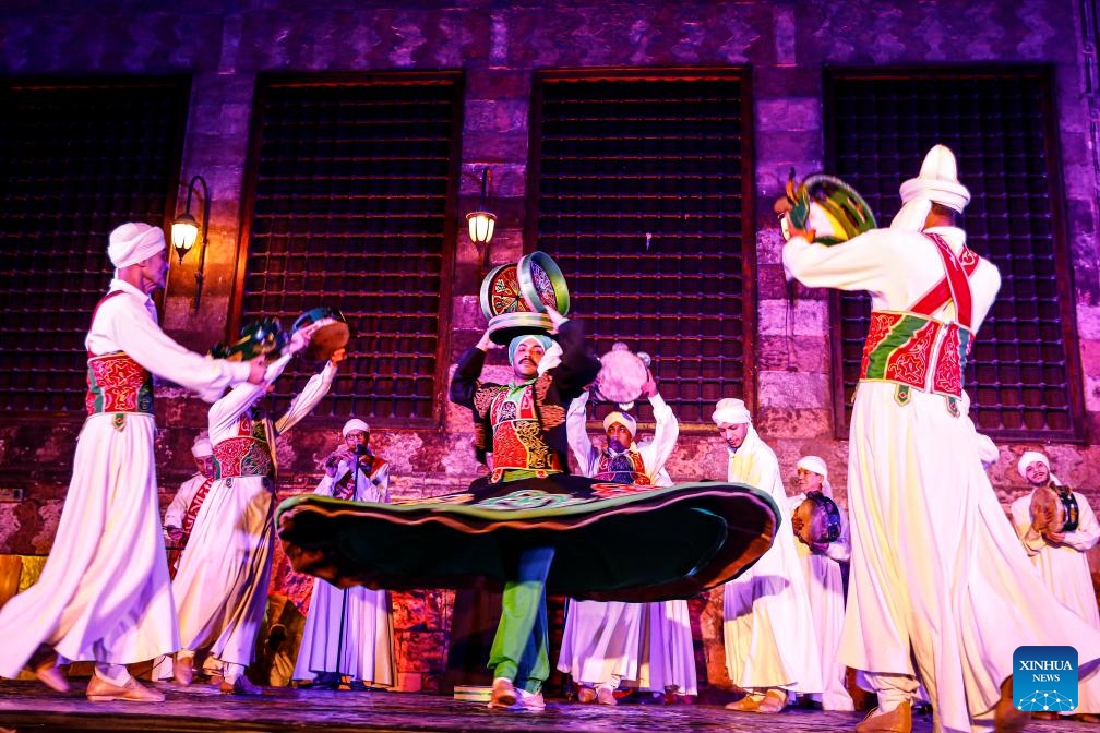 A dancer performs Tanoura, a traditional Egyptian folk dance, during the holy month of Ramadan at the Sultan Al-Ghuri complex in Cairo, Egypt, on March 12, 2025. (Photo: Xinhua)