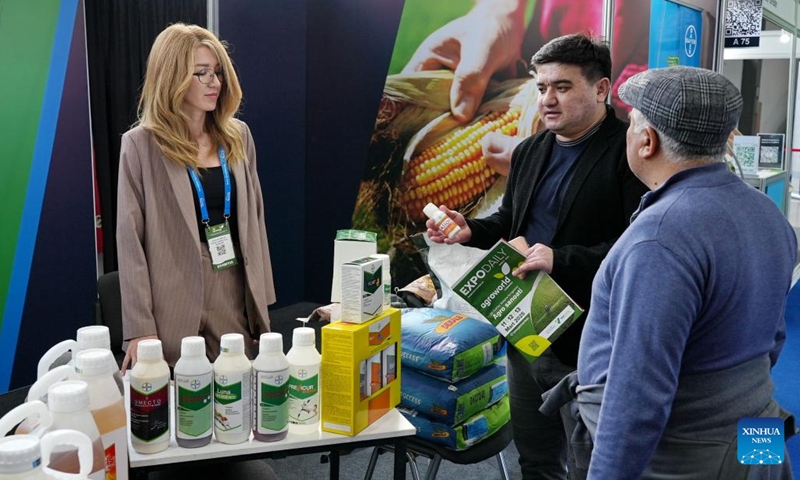 People visit a booth at the international exhibition AgroWorld Uzbekistan in Tashkent, the capital of Uzbekistan, March 11, 2025. The three-day exhibition, with exhibits covering a wide range of fields, including agricultural machinery and accessories, crop cultivation, animal husbandry, and poultry farming, opened here on Tuesday. (Photo: Xinhua)
