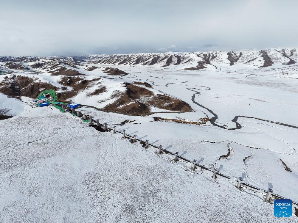 An aerial drone photo taken on March 17, 2025 shows the Banyou No.1 Tunnel along the Xining-Chengdu railway in Ruoergai County of Aba Tibetan and Qiang Autonomous Prefecture, southwest China's Sichuan Province. The tunnel, part of the Sichuan section of Xining-Chengdu railway, has been drilled through on Monday. With a length of 582.23 meters, the single-hole double-track tunnel has a design speed of 250 km per hour.  (Photo: Xinhua)
