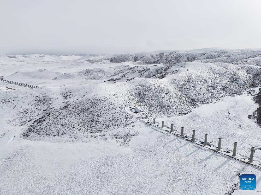 An aerial drone photo taken on March 17, 2025 shows the Banyou No.1 Tunnel along the Xining-Chengdu railway in Ruoergai County of Aba Tibetan and Qiang Autonomous Prefecture, southwest China's Sichuan Province. The tunnel, part of the Sichuan section of Xining-Chengdu railway, has been drilled through on Monday. With a length of 582.23 meters, the single-hole double-track tunnel has a design speed of 250 km per hour. (Photo: Xinhua)