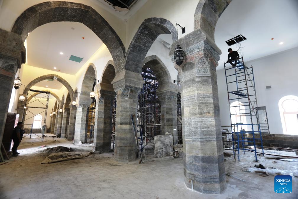 This photo taken on March 17, 2025 shows the reconstruction site of the Grand al-Nuri Mosque and its al-Hadbaa minaret in the old city of Mosul, Iraq. The Grand al-Nuri Mosque was built in 1172 with its famous leaning minaret, which gave the city its nickname al-Hadbaa or the hunchback. In 2017, the Islamic State (IS) militants blew up Mosul's al-Nuri Mosque and its al-Hadbaa minaret. (Photo: Xinhua)