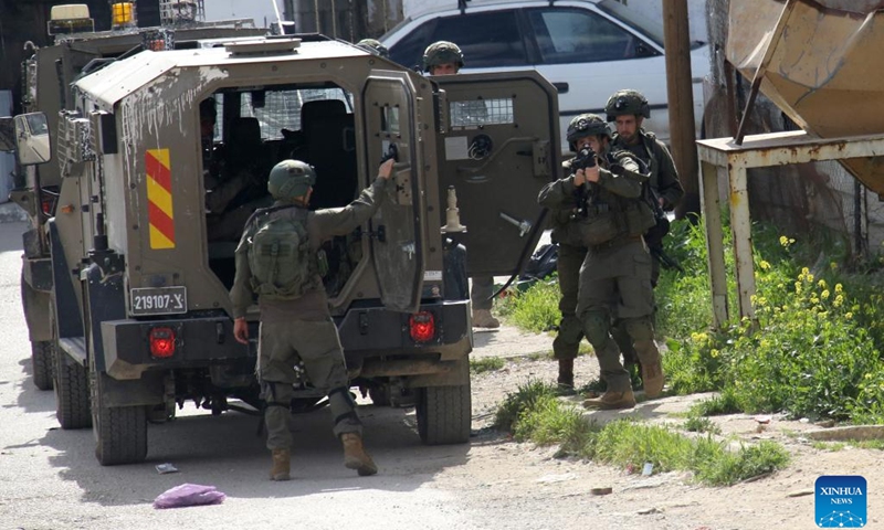 Israeli soldiers are seen during a military operation in the Askar al-Jadid camp, east of Nablus in the West Bank, on March 18, 2025. (Photo: Xinhua)