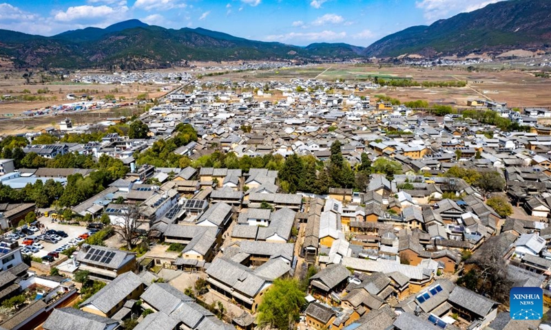 An aerial drone photo shows a view of Shaxi Town in Jianchuan County, southwest China's Yunnan Province, March 17, 2025. Shaxi, a remote township in Jianchuan County, was once an important trading hub for tea, herbs, silk and salt on the ancient Tea Horse Road, a trade route dating back to the Tang Dynasty (618-907). The ancient temples, old alleys and caravansaries of the ancient town are reminders of past glories and attract tourists from around the world. (Photo: Xinhua)