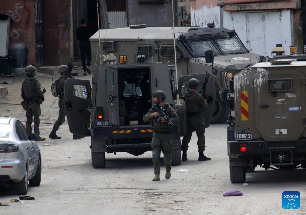 Israeli soldiers are seen during a military operation in the Askar al-Jadid camp, east of Nablus in the West Bank, on March 18, 2025. (Photo: Xinhua)