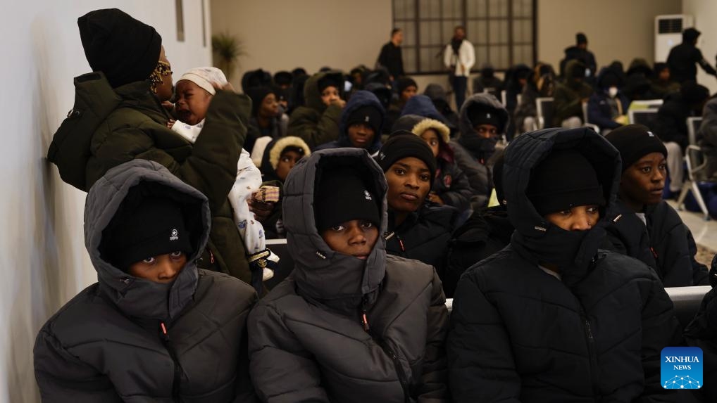 Migrants of Nigerian nationality wait for deportation at the Deportation Office of the Illegal Migration Control Department in Tripoli, Libya, on March 18, 2025. Libya on Tuesday deported 177 Nigerian migrants, mostly women, as part of a voluntary repatriation program, the country's Illegal Migration Control Department said. (Photo: Xinhua)