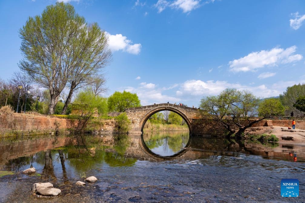 Tourists visit Shaxi Town in Jianchuan County, southwest China's Yunnan Province, March 17, 2025. Shaxi, a remote township in Jianchuan County, was once an important trading hub for tea, herbs, silk and salt on the ancient Tea Horse Road, a trade route dating back to the Tang Dynasty (618-907). The ancient temples, old alleys and caravansaries of the ancient town are reminders of past glories and attract tourists from around the world. (Photo: Xinhua)