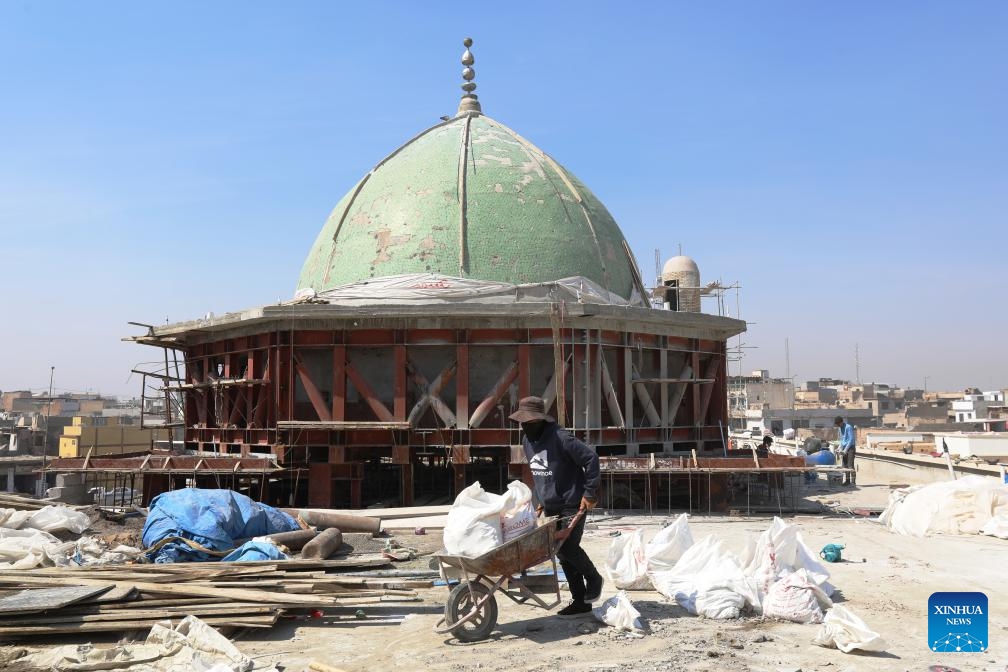 This photo taken on March 17, 2025 shows the reconstruction site of the Grand al-Nuri Mosque and its al-Hadbaa minaret in the old city of Mosul, Iraq. The Grand al-Nuri Mosque was built in 1172 with its famous leaning minaret, which gave the city its nickname al-Hadbaa or the hunchback. In 2017, the Islamic State (IS) militants blew up Mosul's al-Nuri Mosque and its al-Hadbaa minaret. (Photo: Xinhua)