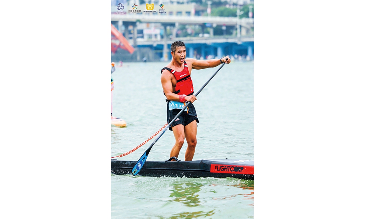 Shi Deqiang participates in a paddle competition event in Qingtian, East China's Zhejiang Province, on October 19, 2024. Photo: Courtesy of Shi Deqiang