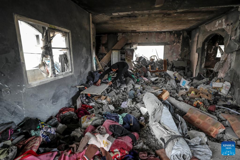 A Palestinian man is seen in a destroyed building after an Israeli airstrike in the northern Gaza Strip town of Beit Lahia, on March 20, 2025. The Israeli military said on Thursday its forces had begun ground operations in northern Gaza, while Hamas' armed wing claimed responsibility for rocket attacks on central Israel, including Tel Aviv, escalating hostilities as a weeks-long ceasefire collapses. Israeli troops began what the military described as ground activity overnight in the Beit Lahia area of northern Gaza, near the coastal border. (Photo: Xinhua)