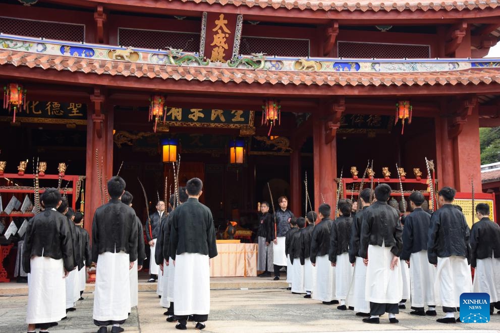 People attend a solemn ceremony to honor the revered ancient Chinese educator and philosopher Confucius at Tainan Confucius Temple in Tainan, southeast China's Taiwan, March 20, 2025. (Photo: Xinhua)