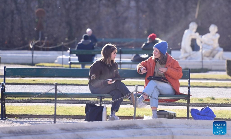 People enjoy their leisure time at the Belvedere Garden in Vienna, Austria, March 19, 2025. As the temperature here has been rising, people came to the Belvedere Garden to enjoy the sunny days. (Photo: Xinhua)