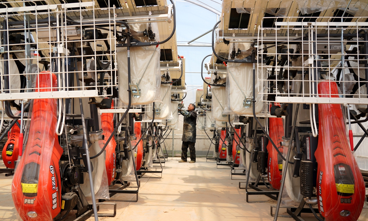 A farmer organizes agricultural machinery in preparation for farming activities in Yueqing, East China's Zhejiang Province, on March 19, 2025. Photo: IC