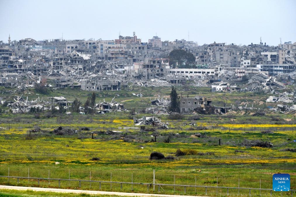 Photo taken on March 20, 2025 shows destroyed buildings in Gaza, as seen from southern Israeli border with Gaza. The Israeli military said on Thursday its troops were expanding their ground operation in southern Gaza, advancing into the Shabura refugee camp in Rafah city. (Photo: Xinhua)