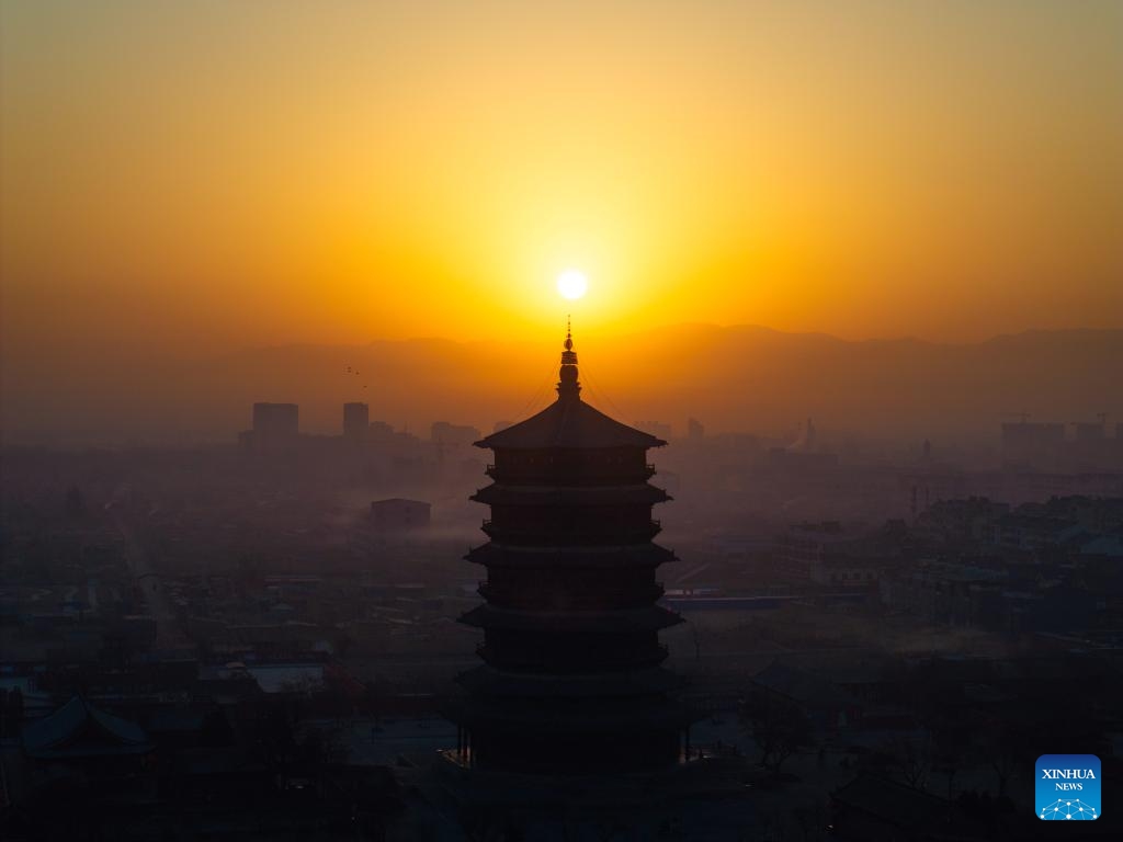 An aerial drone photo taken on Feb. 27, 2025 shows the Sakyamuni Pagoda of Fogong Temple in Yingxian County, north China's Shanxi Province. Sakyamuni Pagoda of Fogong Temple, well known as the Wooden Pagoda of Yingxian County, was built in the year 1056 AD with tenon-and-mortise work. The 67.31-meter-high building is the tallest and oldest wooden multi-story structure in the world, according to the United Nations Educational, Scientific and Cultural Organization (UNESCO). (Photo: Xinhua)