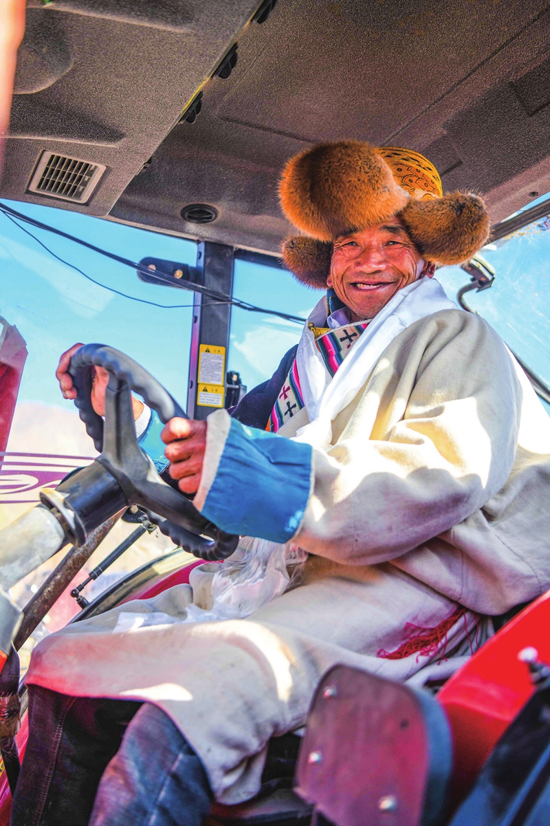 A villager drives a tractor during a traditional spring plowing ceremony in Xierong village, Lhasa, Southwest China's Xizang Autonomous Region, on March 15, 2025. Photo: VCG