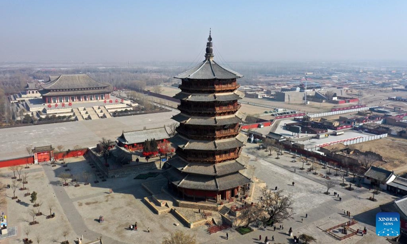 An aerial drone photo taken on Feb. 27, 2025 shows the Sakyamuni Pagoda of Fogong Temple in Yingxian County, north China's Shanxi Province. Sakyamuni Pagoda of Fogong Temple, well known as the Wooden Pagoda of Yingxian County, was built in the year 1056 AD with tenon-and-mortise work. The 67.31-meter-high building is the tallest and oldest wooden multi-story structure in the world, according to the United Nations Educational, Scientific and Cultural Organization (UNESCO). (Photo: Xinhua)
