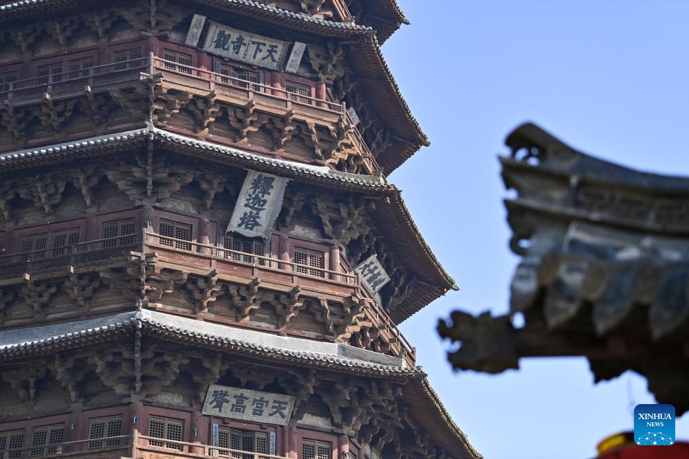 This photo taken on Feb. 27, 2025 shows the Sakyamuni Pagoda of Fogong Temple in Yingxian County, north China's Shanxi Province. Sakyamuni Pagoda of Fogong Temple, well known as the Wooden Pagoda of Yingxian County, was built in the year 1056 AD with tenon-and-mortise work. The 67.31-meter-high building is the tallest and oldest wooden multi-story structure in the world, according to the United Nations Educational, Scientific and Cultural Organization (UNESCO). (Photo: Xinhua)