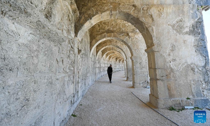 A man visits the Aspendos Antique Theater in Antalya, Türkiye, March 21, 2025. Photo: Xinhua