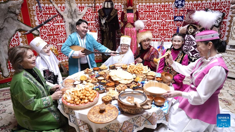 Citizens enjoy specialty dishes to celebrate the Nauryz festival in Astana, Kazakhstan, on March 21, 2025. People in Kazakhstan are enjoying a five-day holiday to celebrate Nauryz, the traditional New Year, from March 21 to 25. In Kazakh, Nauryz means bidding farewell to the old and welcoming the new. Photo: Xinhua