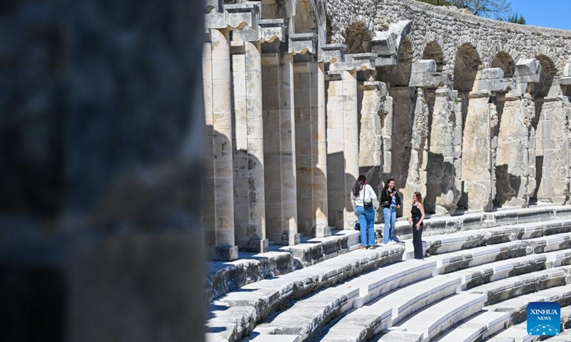 Tourists visit the Aspendos Antique Theater in Antalya, Türkiye, March 21, 2025. Photo: Xinhua