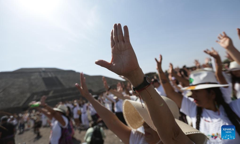People bask in the sunshine during the Spring Equinox at the Pyramid of the Sun in the archaeological zone of Teotihuacan, Mexico, March 21, 2025. Every Spring Equinox, people gather to gather energy at the Pyramid of the Sun here. Photo: Xinhua