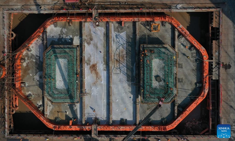 An aerial drone photo taken on March 22, 2025 shows the foundation cap of Pier 5 of the Taoyaomen highway-railway bridge in east China's Zhejiang Province. The second layer of concrete pouring for the foundation cap of Pier 5 of the bridge, a crucial cross-sea passage connecting Cezi Island and Fuchi Island of the Zhoushan Islands, was completed on Saturday, marking the transition of the bridge construction into the main tower phase. The 1,531-meter-long bridge, with a main span of 666 meters, serves as a key project of the Ningbo-Zhoushan Railway. Photo: Xinhua