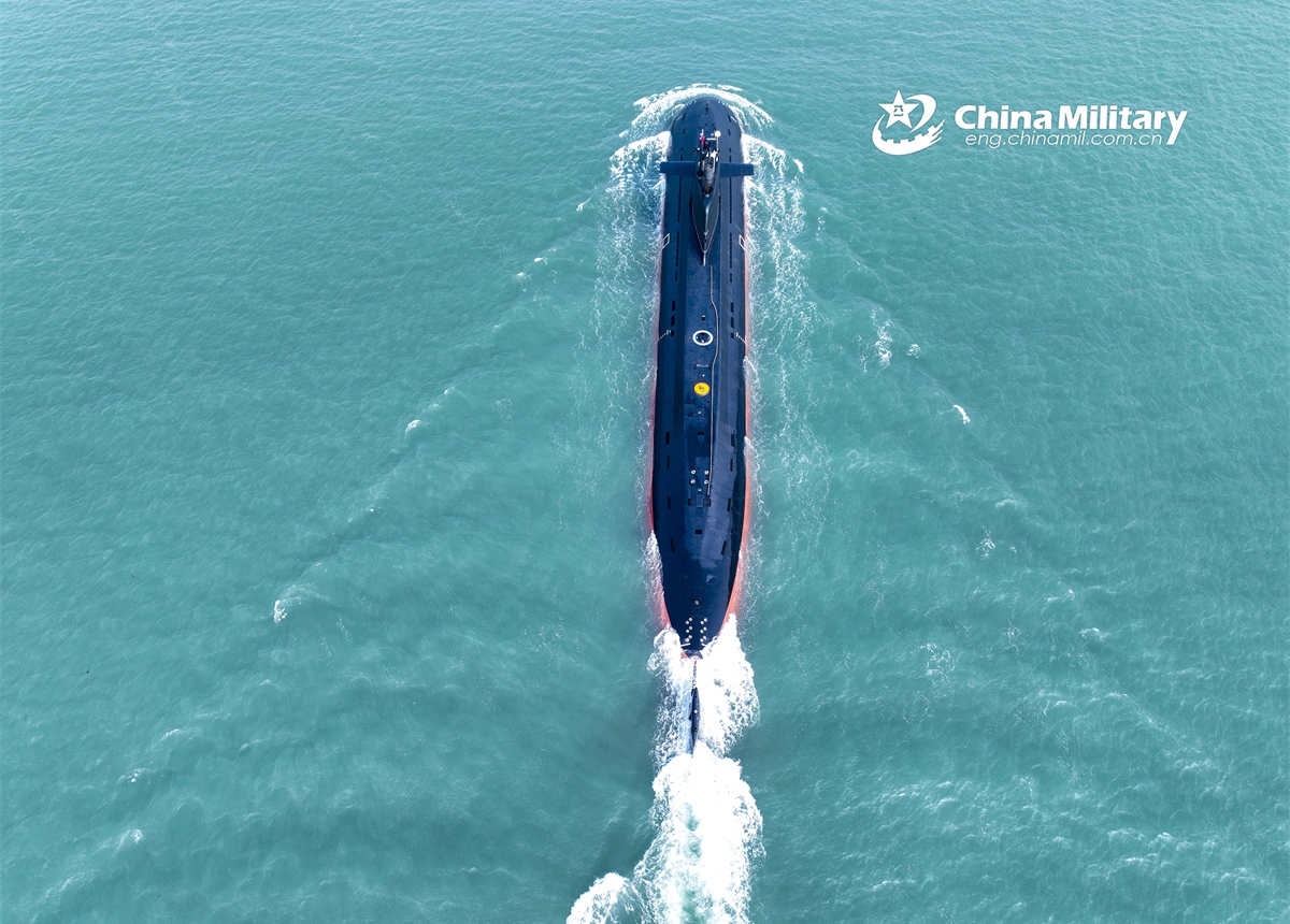 A submarine attached to a submarine flotilla with the navy under the Chinese PLA Northern Theater Command steams towards the designated area during a recent maritime training exercise. (eng.chinamil.com.cn/Photo by Zhang Nan)
