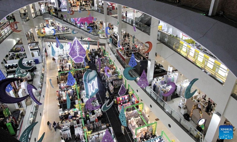 People shop during sales offering discounts ahead of holidays of Eid al-Fitr at Mall Solo Paragon in Surakarta, Central Java, Indonesia, March 22, 2025. Photo: Xinhua