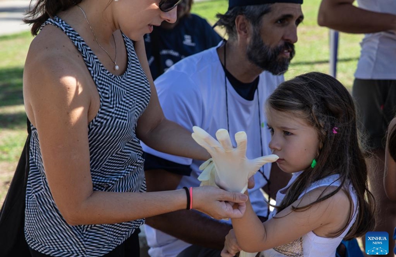 Volunteers prepare for a beach cleanup at Flamengo Beach in Rio de Janeiro, Brazil, March 22, 2025. On the occasion of World Water Day falling on Saturday, multiple cities in Brazil's Rio de Janeiro state launched large-scale beach cleanup campaigns, with hundreds of volunteers working together to remove marine litter, aiming to raise public awareness of ocean conservation and sustainable development. Photo: Xinhua