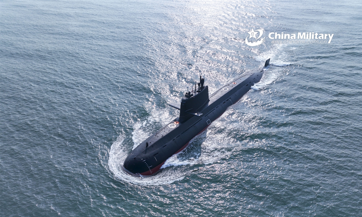 A submarine attached to a submarine flotilla with the navy under the Chinese PLA Northern Theater Command steams towards the designated area during a recent maritime training exercise. (eng.chinamil.com.cn/Photo by Zhang Nan)