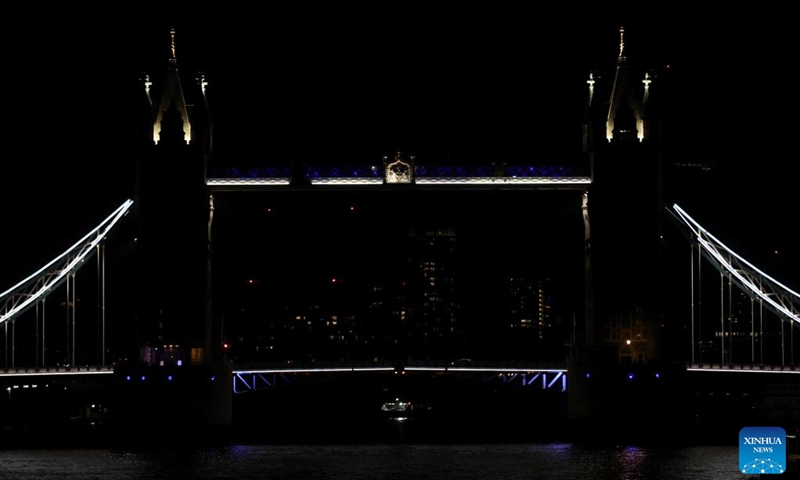 This photo taken on March 22, 2025 shows the Tower Bridge during the Earth Hour event in London, Britain. Photo: Xinhua