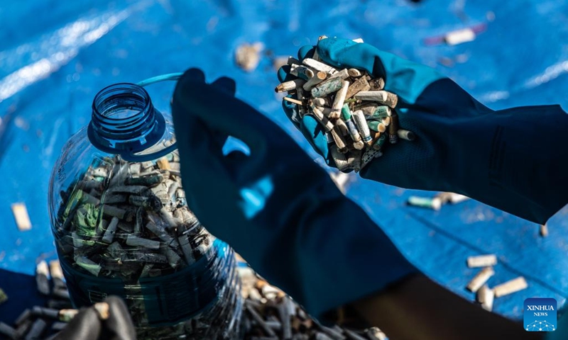 A volunteer sorts collected waste during a beach cleanup campaign at Flamengo Beach in Rio de Janeiro, Brazil, March 22, 2025. On the occasion of World Water Day falling on Saturday, multiple cities in Brazil's Rio de Janeiro state launched large-scale beach cleanup campaigns, with hundreds of volunteers working together to remove marine litter, aiming to raise public awareness of ocean conservation and sustainable development. Photo: Xinhua