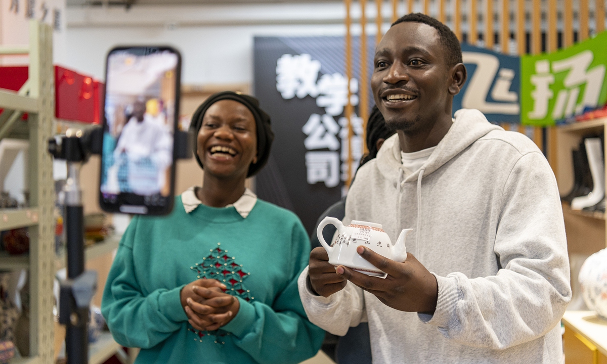 International students from Rwanda practice livestreaming sales techniques in Chinese at Jinhua University of Vocational Technology, East China's Zhejiang Province, on June 25, 2024. Photos on this page: VCG