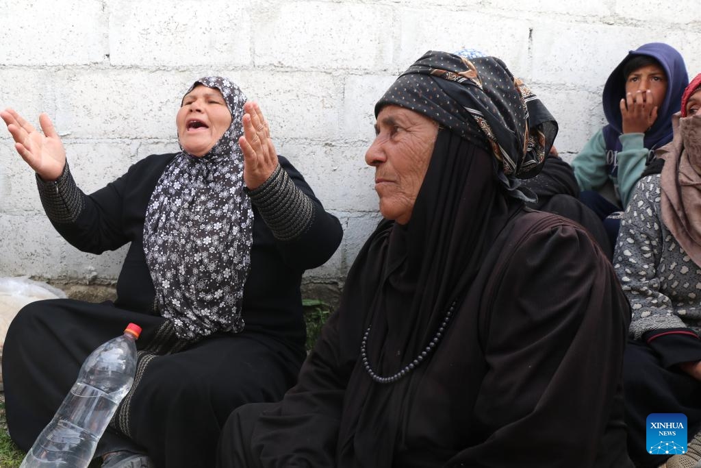 People fleeing the town of Koayiah gather at a shelter in Daraa, southern Syria, on March 25, 2025. Six civilians were killed and several others injured after Israeli forces shelled the town of Koayiah in Daraa on Tuesday, according to Syria's foreign affairs authorities. (Photo: Xinhua)