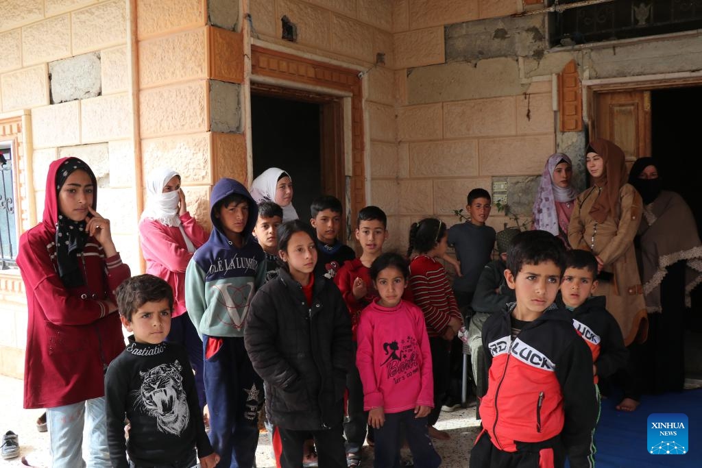 People fleeing the town of Koayiah gather at a shelter in Daraa, southern Syria, on March 25, 2025. Six civilians were killed and several others injured after Israeli forces shelled the town of Koayiah in Daraa on Tuesday, according to Syria's foreign affairs authorities. (Photo: Xinhua)