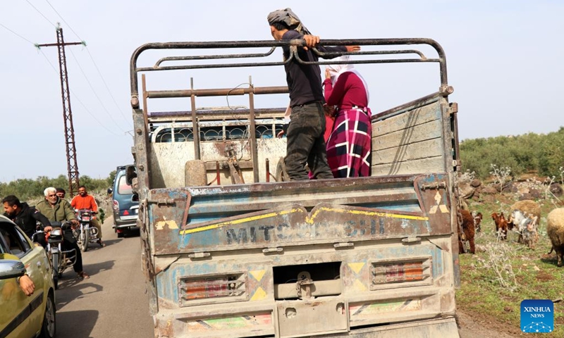 People fleeing the town of Koayiah are seen in Daraa, southern Syria, on March 25, 2025. Six civilians were killed and several others injured after Israeli forces shelled the town of Koayiah in Daraa on Tuesday, according to Syria's foreign affairs authorities. (Photo: Xinhua)